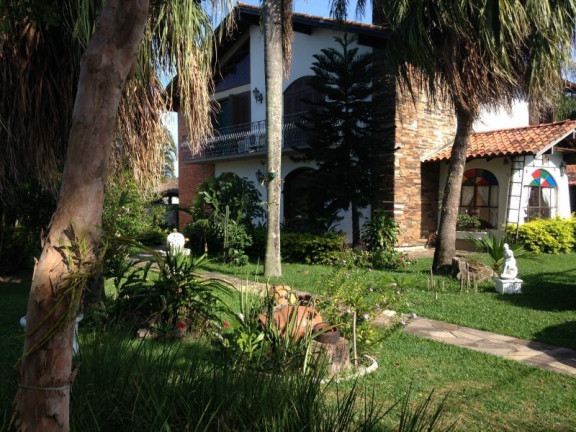 Imagem Casa com 3 Quartos à Venda, 339 m² em Ipanema - Porto Alegre
