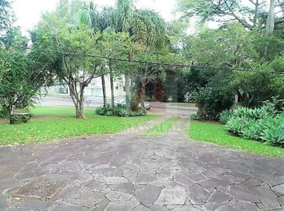 Imagem Casa com 5 Quartos à Venda, 472 m² em Cavalhada - Porto Alegre Imagem Casa com 5 Quartos à Venda, 472 m² em Cavalhada - Porto Alegre