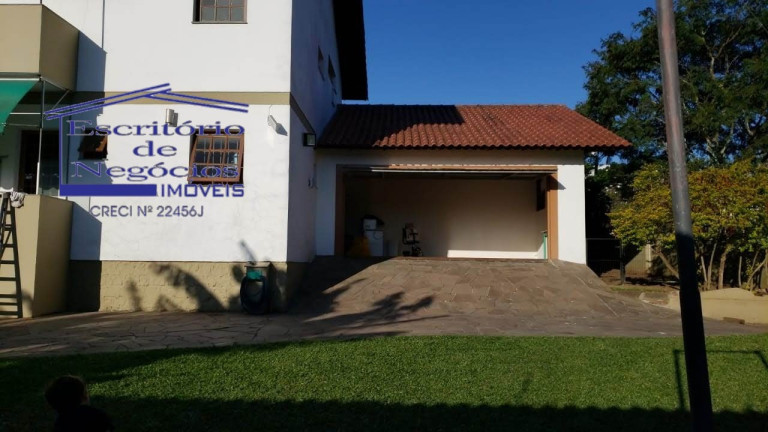 Imagem Casa com 4 Quartos à Venda, 268 m² em Cavalhada - Porto Alegre Imagem Casa com 4 Quartos à Venda, 268 m² em Cavalhada - Porto Alegre
