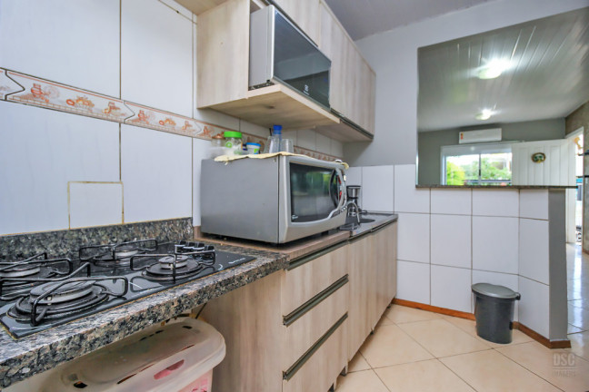 Imagem Casa com 2 Quartos à Venda, 51 m² em Hípica - Porto Alegre Imagem Casa com 2 Quartos à Venda, 51 m² em Hípica - Porto Alegre