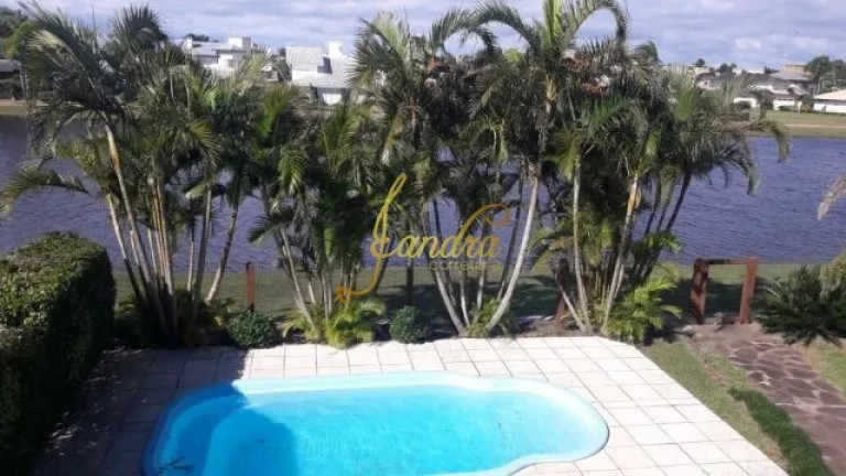 Imagem Casa de Condomínio com 4 Quartos à Venda, 230 m² em Atlantida - Xangri-la