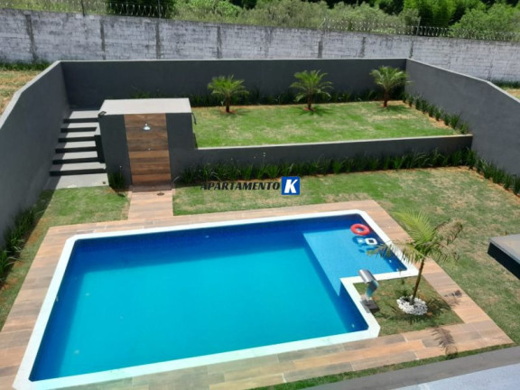 Imagem Casa de Condomínio com 4 Quartos à Venda, 257 m²