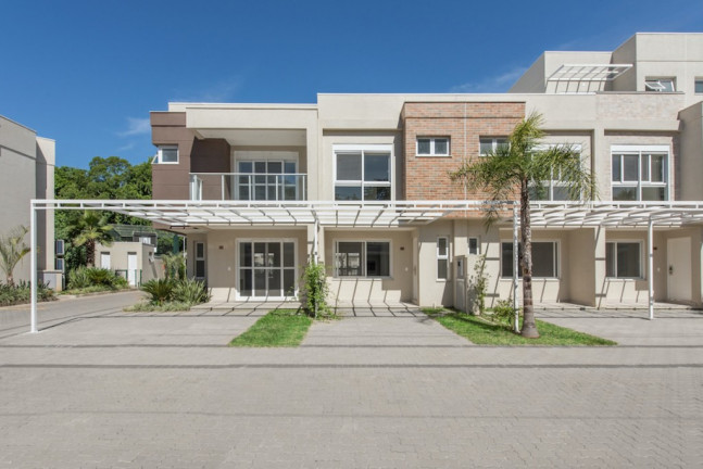 Imagem Casa de Condomínio com 3 Quartos à Venda, 191 m² em Vila Nova - Porto Alegre