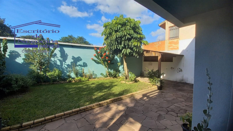 Imagem Casa com 4 Quartos à Venda, 260 m² em Vila Nova - Porto Alegre