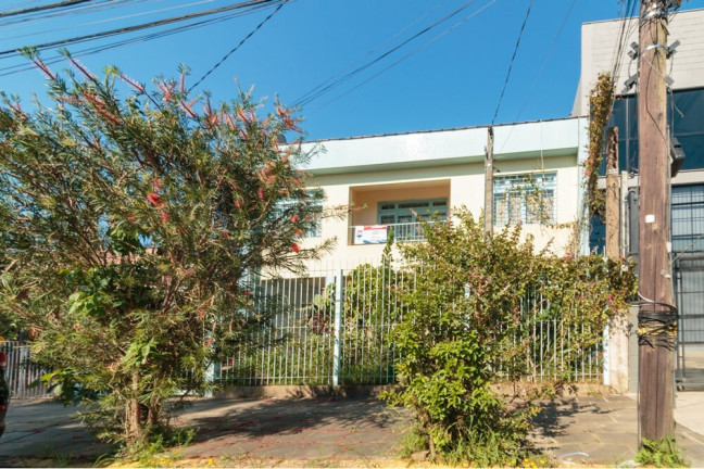Imagem Casa com 3 Quartos à Venda, 195 m² em Santa Maria Goretti - Porto Alegre Imagem Casa com 3 Quartos à Venda, 195 m² em Santa Maria Goretti - Porto Alegre