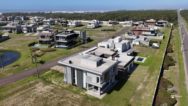 Imagem Casa de Condomínio com 4 Quartos à Venda, 250 m² em Capão Novo - Capão Da Canoa