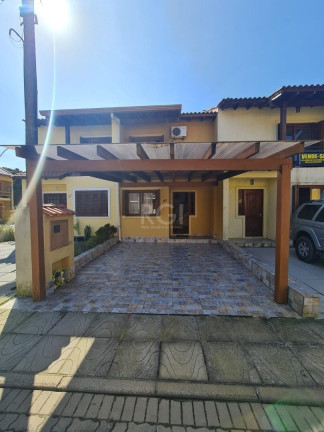 Imagem Casa de Condomínio com 2 Quartos à Venda, 72 m² em Hípica - Porto Alegre