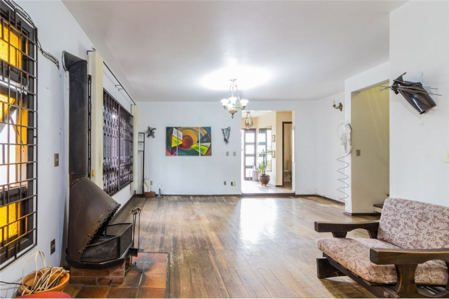 Imagem Casa com 4 Quartos à Venda, 313 m² em Cavalhada - Porto Alegre