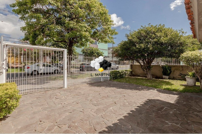 Imagem Casa com 4 Quartos à Venda, 381 m² em Camaquã - Porto Alegre Imagem Casa com 4 Quartos à Venda, 381 m² em Camaquã - Porto Alegre