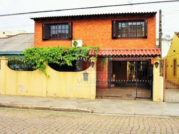 Imagem Casa com 4 Quartos à Venda, 224 m² em Santa Maria Goretti - Porto Alegre Imagem Casa com 4 Quartos à Venda, 224 m² em Santa Maria Goretti - Porto Alegre
