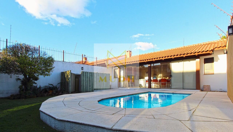 Imagem Casa com 4 Quartos à Venda, 300 m² em Ipanema - Porto Alegre