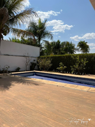Imagem Casa de Condomínio com 4 Quartos à Venda, 444 m² em Loteamento Alphaville Residencial - Goiânia