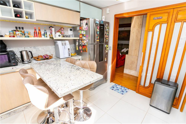 Imagem Casa com 4 Quartos à Venda, 400 m² em Jardim Planalto - Porto Alegre