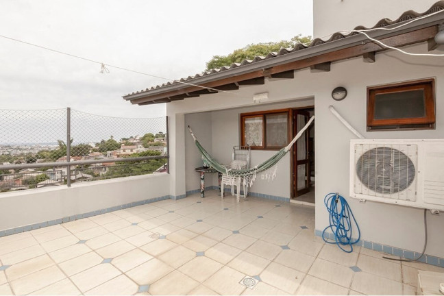 Imagem Casa com 3 Quartos à Venda, 160 m² em Nonoai - Porto Alegre