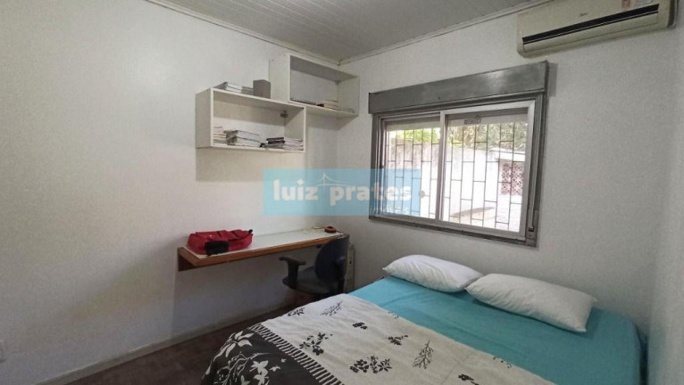 Imagem Casa com 2 Quartos à Venda, 130 m² em Cavalhada - Porto Alegre