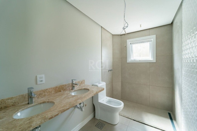 Imagem Imóvel com 3 Quartos à Venda, em Vila Nova - Porto Alegre Imagem Imóvel com 3 Quartos à Venda, em Vila Nova - Porto Alegre