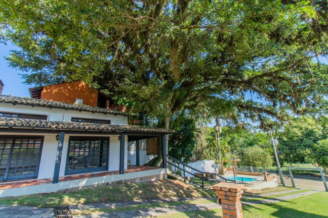 Imagem Casa com 4 Quartos à Venda, 348 m² em Ipanema - Porto Alegre