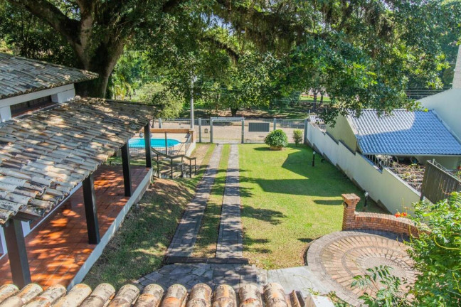 Imagem Casa com 4 Quartos à Venda, 348 m² em Ipanema - Porto Alegre