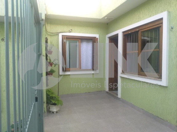 Imagem Casa com 3 Quartos à Venda, 94 m² em Vila Nova - Porto Alegre