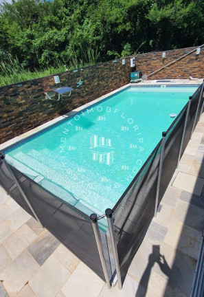 Imagem Casa de Condomínio com 4 Quartos à Venda, 224 m² em Ponta Das Canas - Florianópolis