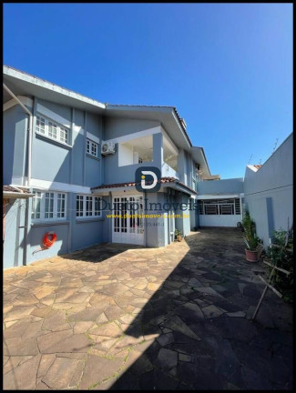 Imagem Casa com 4 Quartos à Venda, 284 m² em Camobi - Santa Maria