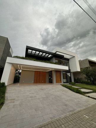 Imagem Casa de Condomínio com 5 Quartos à Venda, 454 m² em Centro - Capão Da Canoa