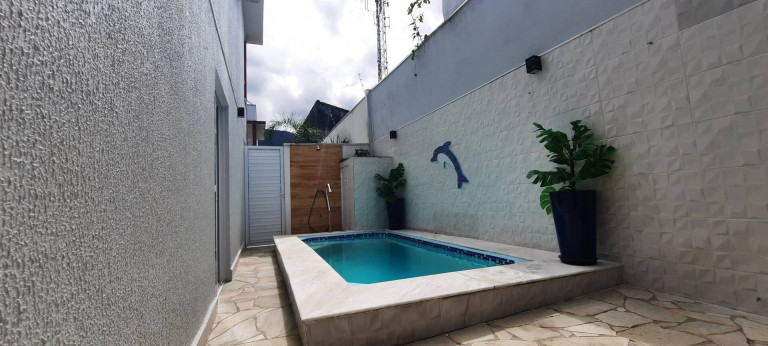 Imagem Casa de Condomínio com 2 Quartos à Venda, 110 m² em Massaguaçu - Caraguatatuba Imagem Casa de Condomínio com 2 Quartos à Venda, 110 m² em Massaguaçu - Caraguatatuba