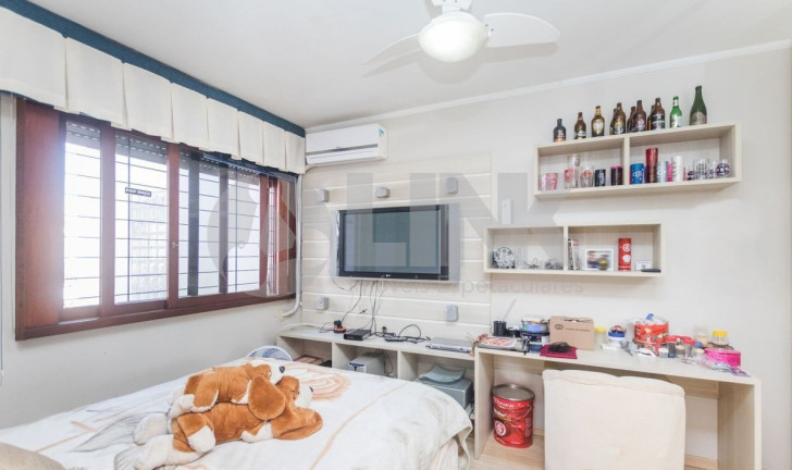 Imagem Sobrado com 3 Quartos à Venda, 316 m² em Jardim Lindóia - Porto Alegre