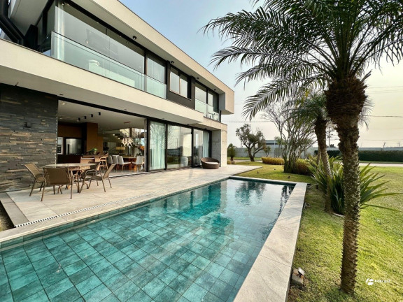 Imagem Casa de Condomínio com 5 Quartos à Venda, 596 m² em Centro - Xangri-lá Imagem Casa de Condomínio com 5 Quartos à Venda, 596 m² em Centro - Xangri-lá
