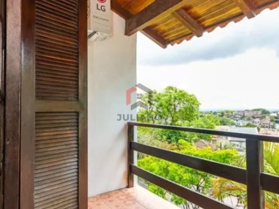 Imagem Casa com 4 Quartos à Venda, 280 m² em Vila Jardim - Porto Alegre