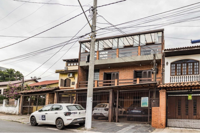 Imagem Casa com 3 Quartos à Venda, 380 m² em Partenon - Porto Alegre Imagem Casa com 3 Quartos à Venda, 380 m² em Partenon - Porto Alegre