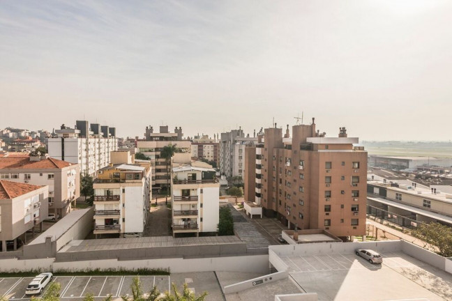 Imagem Imóvel com 2 Quartos à Venda, 51 m² em Jardim Lindóia - Porto Alegre