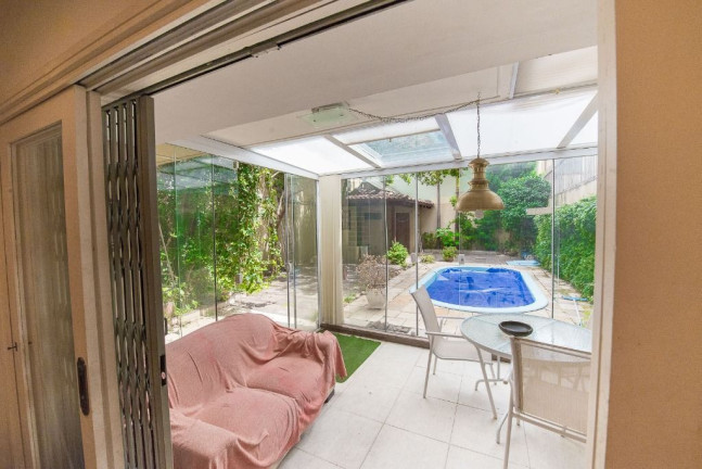Imagem Casa com 4 Quartos à Venda, 272 m² em Rio Branco - Porto Alegre