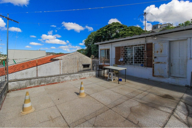 Imagem Casa com 5 Quartos à Venda, 254 m² em Três Figueiras - Porto Alegre
