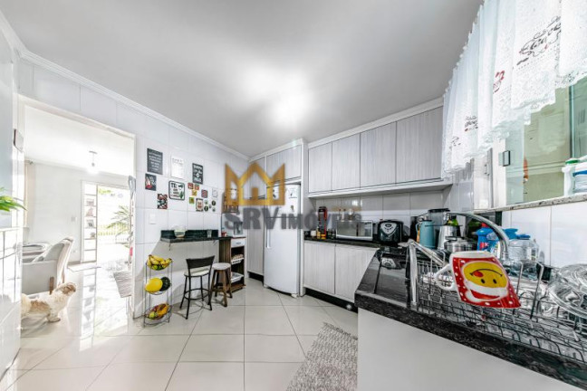 Imagem Sobrado com 3 Quartos à Venda, 235 m² em Atuba - Curitiba