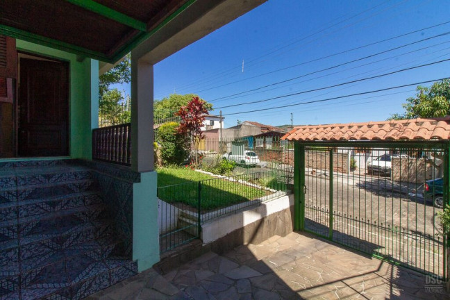 Imagem Casa com 3 Quartos à Venda, 216 m² em Vila Nova - Porto Alegre
