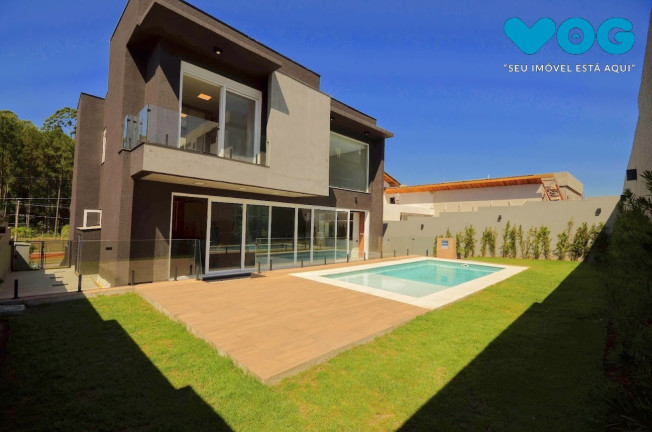 Imagem Casa com 4 Quartos à Venda, 290 m² em Vila Nova - Porto Alegre Imagem Casa com 4 Quartos à Venda, 290 m² em Vila Nova - Porto Alegre
