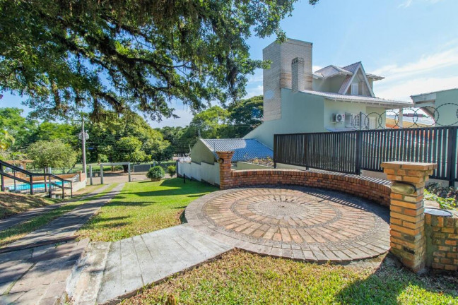 Imagem Casa com 4 Quartos à Venda, 348 m² em Ipanema - Porto Alegre
