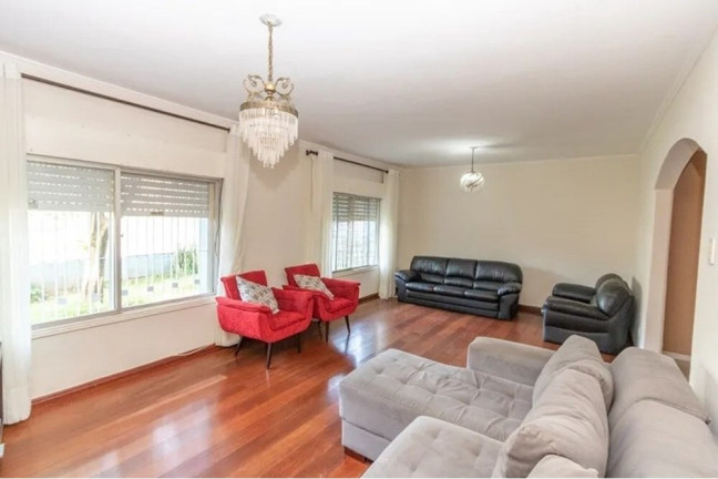 Imagem Casa com 4 Quartos à Venda, 239 m² em Nonoai - Porto Alegre