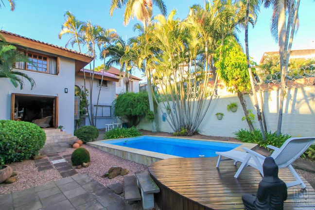Imagem Casa com 4 Quartos à Venda, 321 m² em Vila Assunção - Porto Alegre Imagem Casa com 4 Quartos à Venda, 321 m² em Vila Assunção - Porto Alegre