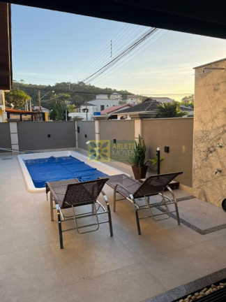 Imagem Casa com 4 Quartos à Venda, 180 m² em Centro - Porto Belo