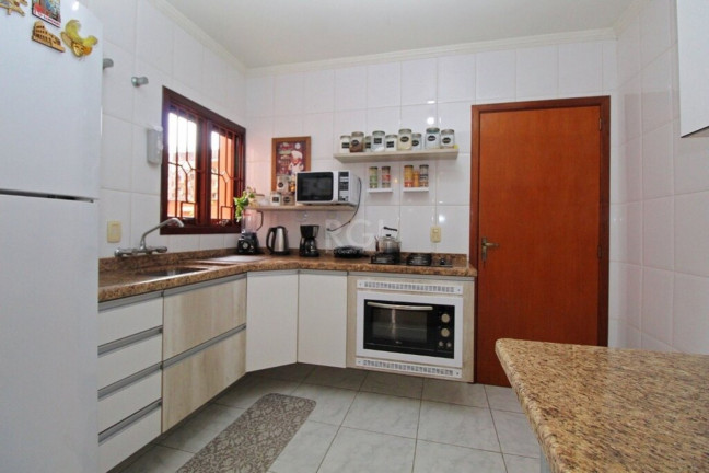 Imagem Imóvel com 3 Quartos à Venda, em Medianeira - Porto Alegre Imagem Imóvel com 3 Quartos à Venda, em Medianeira - Porto Alegre