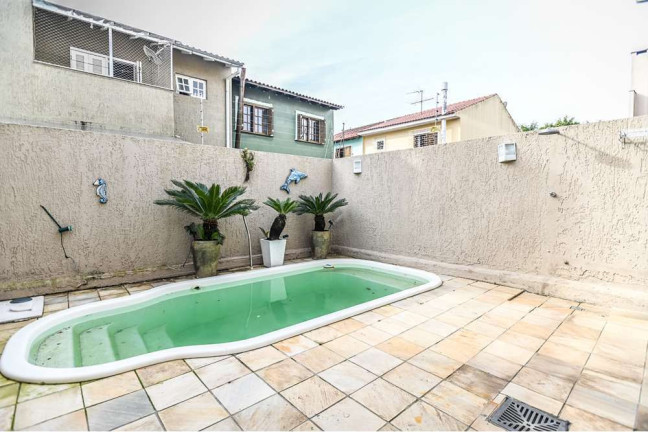 Imagem Casa com 3 Quartos à Venda, 152 m² em Hípica - Porto Alegre Imagem Casa com 3 Quartos à Venda, 152 m² em Hípica - Porto Alegre