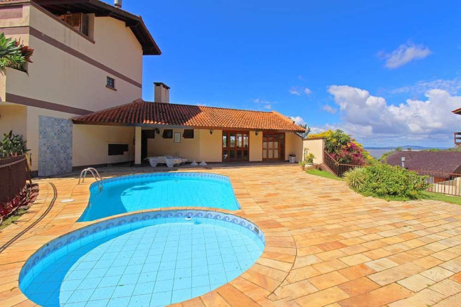 Imagem Casa com 3 Quartos à Venda, 167 m² em Tristeza - Porto Alegre Imagem Casa com 3 Quartos à Venda, 167 m² em Tristeza - Porto Alegre