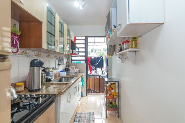 Imagem Casa com 3 Quartos à Venda, 174 m² em Nonoai - Porto Alegre
