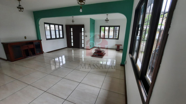 Imagem Casa com 3 Quartos à Venda, 240 m² em Ipanema - Porto Alegre Imagem Casa com 3 Quartos à Venda, 240 m² em Ipanema - Porto Alegre
