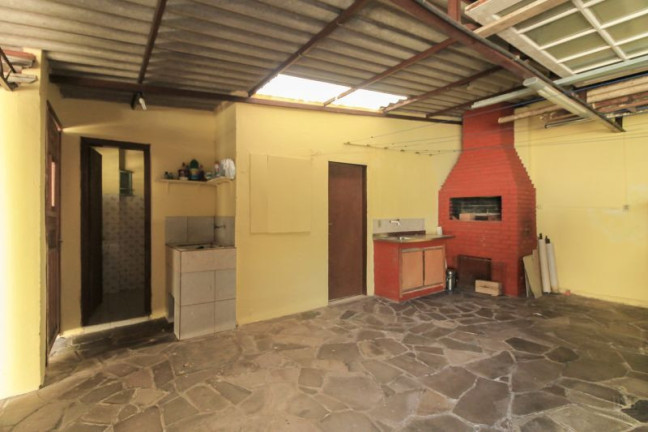 Imagem Casa com 7 Quartos à Venda, 330 m² em Nonoai - Porto Alegre