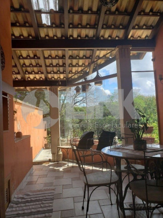 Imagem Casa com 4 Quartos à Venda, 236 m² em Agronomia - Porto Alegre