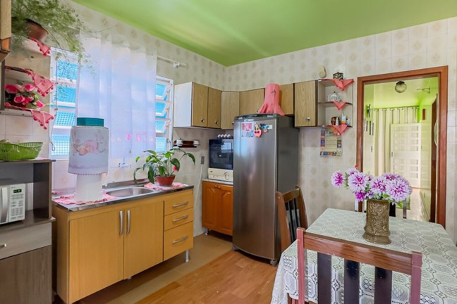 Imagem Casa com 5 Quartos à Venda, 128 m² em Vila Jardim - Porto Alegre