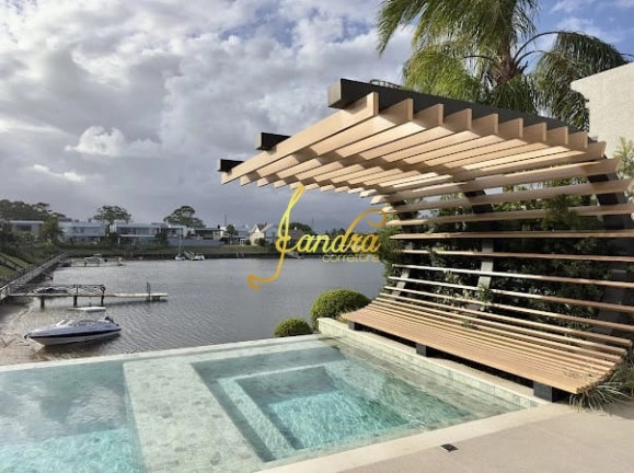 Imagem Casa de Condomínio com 5 Quartos à Venda, 595 m² em Zona Nova - Capão Da Canoa